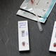 A positive (L) and a negative antibody test for covid-19 are pictured at a pharmacy in Strasbourg, eastern France, on July 15, 2020.